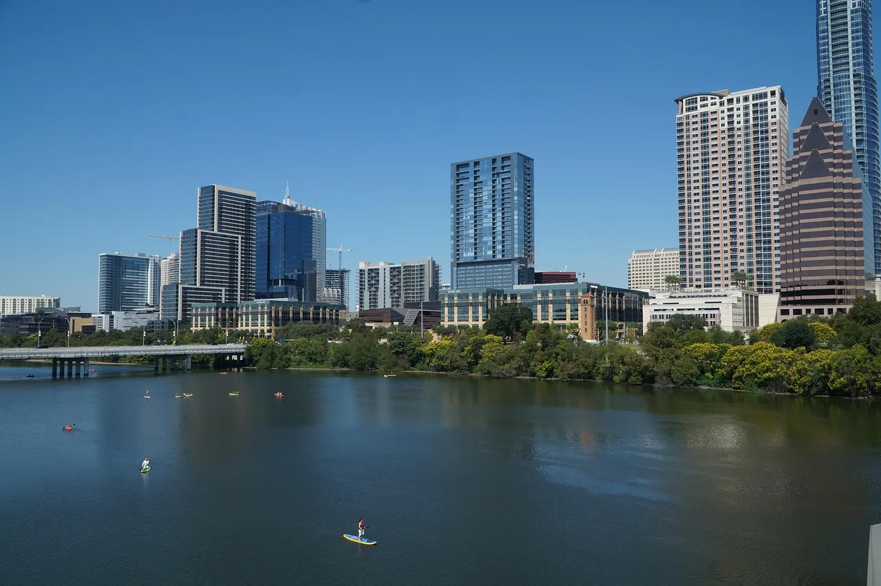architecture, city, nature, skyline, skyscraper, cityscape, austin, texas, lake, blue, buildings, reflections, panorama, downtown, tourism. Austin compared with Seattle for business analytics careers and pay